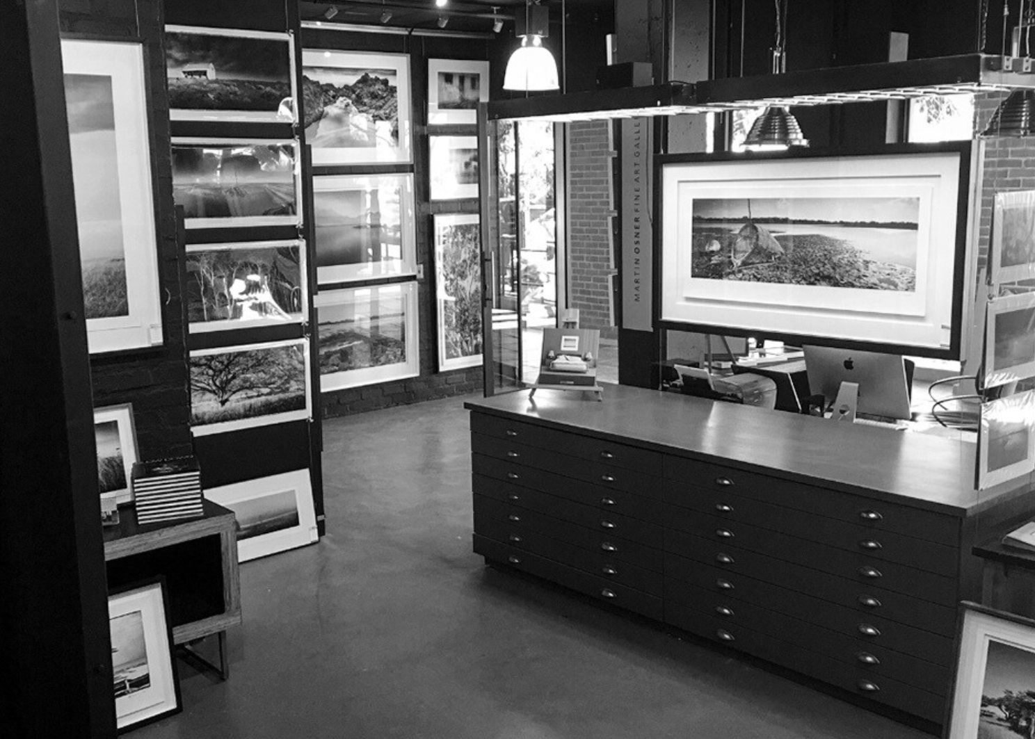 The first Martin Osner gallery in Green Point, walls of framed black and white photographs