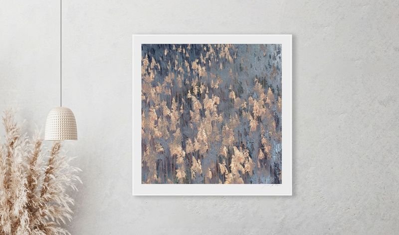 Square print of leaves in a white frame